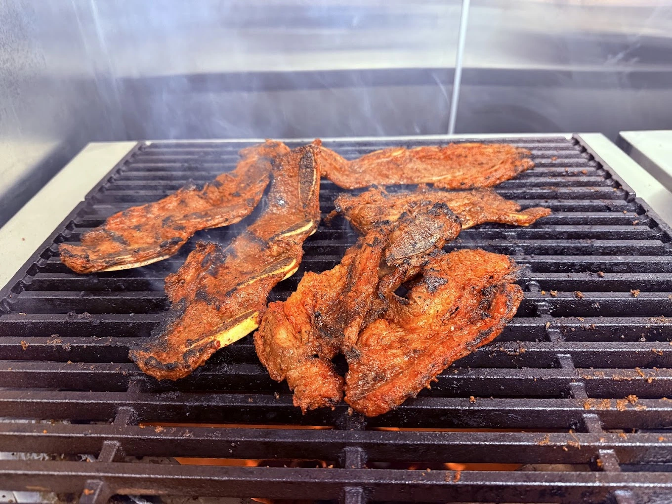 Experience authentic dish at Calgary Hot Plate Restaurant & Sweets in Calgary